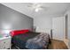 Comfortable bedroom with natural light and wood-look floors, offering a serene retreat at 12660 118Th St, Largo, FL 33778