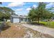 Charming home with a well-maintained front yard, driveway, and convenient access at 12660 118Th St, Largo, FL 33778
