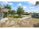 Relaxing front yard view from the front porch with a view of mature landscaping at 12660 118Th St, Largo, FL 33778