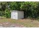 This backyard features an outdoor storage shed, perfect for tools and equipment at 12660 118Th St, Largo, FL 33778
