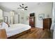 Inviting main bedroom with hardwood floors, natural light, and ample closet space for a comfortable living at 13122 Done Groven Dr, Dover, FL 33527