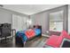 Bedroom with a twin bed, a Spiderman-themed comforter, and a grey wall at 1314 Oak Pond St, Ruskin, FL 33570