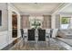 Bright dining room featuring a modern chandelier and elegant decor at 1314 Oak Pond St, Ruskin, FL 33570