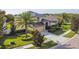 A two-story home with lush landscaping and a driveway at 1314 Oak Pond St, Ruskin, FL 33570