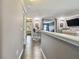 Hallway featuring views into multiple rooms of the house and the home's open floor plan at 1314 Oak Pond St, Ruskin, FL 33570