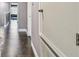 Hallway with hardwood floors leading into the rest of the home at 1314 Oak Pond St, Ruskin, FL 33570