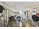Loft space with dark hardwood floors offers access to rooms, and bright light at 1314 Oak Pond St, Ruskin, FL 33570