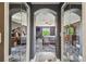 Mirrored doorway reveals a serene bedroom with dark walls and tiled floors, offering a private sanctuary at 1314 Oak Pond St, Ruskin, FL 33570