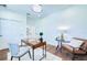 Neutral home office featuring a modern design, wood floors, bright walls, and decorative touches for a stylish workspace at 1410 Nebraska Ave, Palm Harbor, FL 34683
