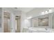 Elegant bathroom with double vanity, spacious shower, and modern fixtures at 14279 Swiss Bridge Dr, Riverview, FL 33579