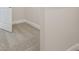 Bedroom featuring soft carpet and a door with white trim at 14279 Swiss Bridge Dr, Riverview, FL 33579