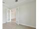Bright office space features glass french doors, hardwood floors, and neutral walls at 14279 Swiss Bridge Dr, Riverview, FL 33579