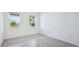 Bright bedroom filled with natural light offers two windows with lovely neighborhood views at 14424 59Th E Cir, Bradenton, FL 34211