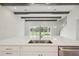 Bright, open kitchen featuring a large island, stainless steel appliances, and stylish finishes at 14531 Swiss Bridge Dr, Lithia, FL 33547