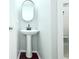 Bathroom features a single sink and white walls at 1510 Mobile Ave, Tampa, FL 33610