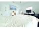 Bedroom with two closets, tv, and natural light from the window at 1510 Mobile Ave, Tampa, FL 33610