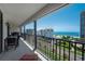 This balcony features an outdoor seating area and picturesque views of the beach and surrounding landscape at 1581 Gulf Blvd # 701N, Clearwater Beach, FL 33767