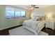 Bright bedroom features water views, neutral paint, and a comfy bed with a large decorative headboard at 1581 Gulf Blvd # 701N, Clearwater Beach, FL 33767