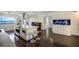 Modern kitchen with stainless steel appliances and a large fish tank in the dining area at 1581 Gulf Blvd # 701N, Clearwater Beach, FL 33767