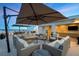 Luxurious rooftop lounge area with plush seating, bar, and stunning panoramic views at 1581 Gulf Blvd # 701N, Clearwater Beach, FL 33767