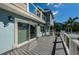 An inviting back deck featuring a modern railing system and ample space for outdoor enjoyment at 160 Shore Dr, Palm Harbor, FL 34683
