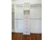 Custom walk-in closet with shelving and drawers for optimal storage and organization at 160 Shore Dr, Palm Harbor, FL 34683