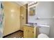 Bathroom area with updated vanity and a shower with classic tile at 1903 24Th St, Sarasota, FL 34234