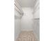 Walk-in closet with shelving, providing ample storage at 1903 24Th St, Sarasota, FL 34234