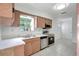 Kitchen featuring stainless steel appliances, practical countertops, and ample natural light at 1903 24Th St, Sarasota, FL 34234