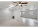 Spacious living room features tile flooring, ceiling fans, and recessed lighting, perfect for entertaining at 1903 24Th St, Sarasota, FL 34234