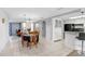 Open dining room showcasing tiled flooring adjoining the kitchen, perfect for meals at 2119 Sugarbush Dr, Holiday, FL 34690