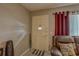 Foyer features tiled flooring, neutral paint and a tan front door at 2466 Ecuadorian Way # 32, Clearwater, FL 33763