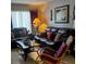 A cozy living room features comfortable seating and stylish décor elements at 2466 Ecuadorian Way # 32, Clearwater, FL 33763