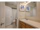 Neutral bathroom with a vanity sink, large mirror, and a shower-tub combination at 247 Los Prados Dr # 1123, Safety Harbor, FL 34695