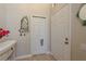 Entryway featuring tile flooring, a closet, decor and neutral-toned walls at 247 Los Prados Dr # 1123, Safety Harbor, FL 34695