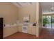 Community kitchen with appliances, sink, and ample counter space near the pool area at 247 Los Prados Dr # 1123, Safety Harbor, FL 34695