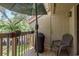 Relaxing patio with a barbecue grill, comfortable seating, and a pleasant outdoor view at 247 Los Prados Dr # 1123, Safety Harbor, FL 34695