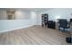 Bright bonus room features neutral walls, durable flooring, and ample space for flexible living at 26082 Woven Wicker Bnd, Lutz, FL 33559