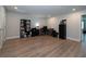 Spacious bonus room with wood floors, room for an office and recreational space at 26082 Woven Wicker Bnd, Lutz, FL 33559