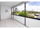 A private balcony offers stunning views of lush greenery and a peaceful community at 2621 Cove Cay Dr # 309, Clearwater, FL 33760