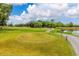 Scenic view of the golf course, showcasing its lush green fairways and serene surroundings at 2621 Cove Cay Dr # 309, Clearwater, FL 33760