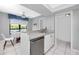 A bright kitchen features stainless steel appliances and an open layout, perfect for modern living at 2621 Cove Cay Dr # 309, Clearwater, FL 33760