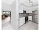 An open view highlights the kitchen and connected living spaces of this inviting condo at 2621 Cove Cay Dr # 309, Clearwater, FL 33760