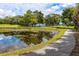 Scenic walking path by the pond in the community at 2621 Cove Cay Dr # 309, Clearwater, FL 33760