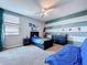 bedroom featuring themed decor and lots of natural light at 2798 Hilliard Dr, Wesley Chapel, FL 33543