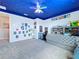 bedroom with star-themed ceiling and colorful wall decor at 2798 Hilliard Dr, Wesley Chapel, FL 33543