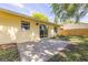 Well-maintained backyard with a patio area, perfect for outdoor entertaining and relaxation at 310 Arbor E Dr, Palm Harbor, FL 34683