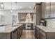 Modern kitchen with stainless steel appliances, granite counters, and decorative backsplash at 311 12Th N Ave, St Petersburg, FL 33701