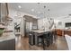 Open kitchen features a large island with seating, stainless steel appliances, and hardwood floors at 311 12Th N Ave, St Petersburg, FL 33701