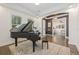 Bright living room featuring hardwood floors, large windows, and an archway to the entryway at 311 12Th N Ave, St Petersburg, FL 33701